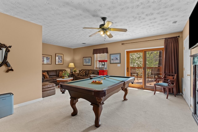 recreation room with light colored carpet, a textured ceiling, pool table, and a ceiling fan