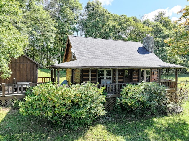 view of front of home with a deck