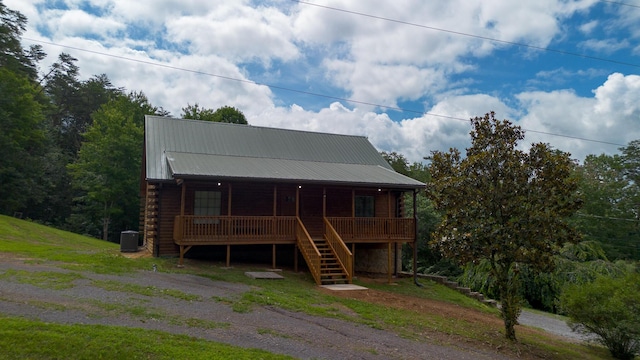 158 Delph Ln, Mooresburg, TN 37811 - view of front of home featuring a porch, stairs, a metal roof, and log exterior