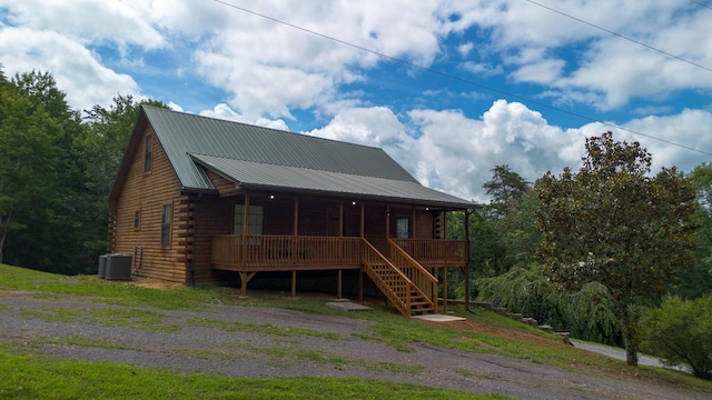 158 Delph Ln, Mooresburg, TN 37811 - view of front of property with log exterior, covered porch, stairs, and a metal roof