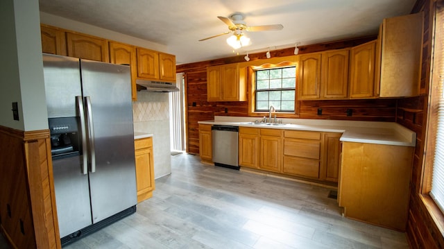158 Delph Ln, Mooresburg, TN 37811 - kitchen featuring stainless steel appliances, under cabinet range hood, a ceiling fan, light countertops, and brown cabinetry