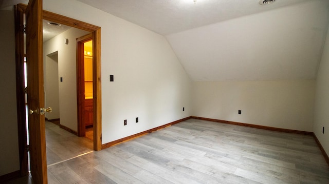 158 Delph Ln, Mooresburg, TN 37811 - additional living space with light wood-style flooring and vaulted ceiling