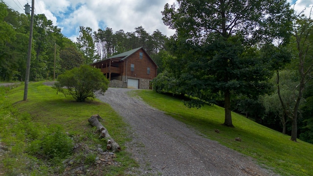 158 Delph Ln, Mooresburg, TN 37811 - log-style house with an attached garage, driveway, a front lawn, and stone siding