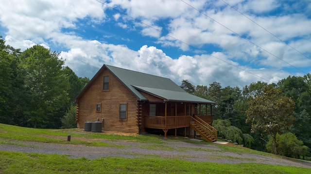 158 Delph Ln, Mooresburg, TN 37811 - rear view of property featuring log exterior, stairs, and a metal roof