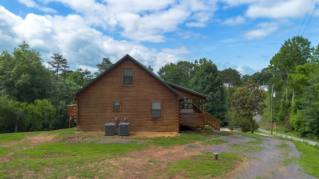 158 Delph Ln, Mooresburg, TN 37811 - view of home's exterior featuring log siding, stairs, a wooden deck, and a yard