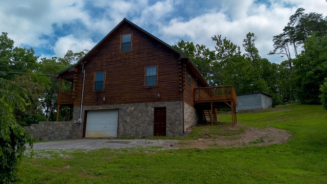 158 Delph Ln, Mooresburg, TN 37811 - view of side of property featuring log siding, an attached garage, stone siding, a lawn, and a wooden deck