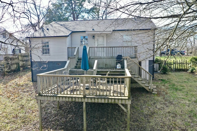 back of property featuring central AC and a deck