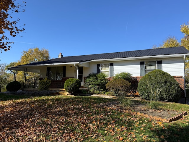 ranch-style house with covered porch