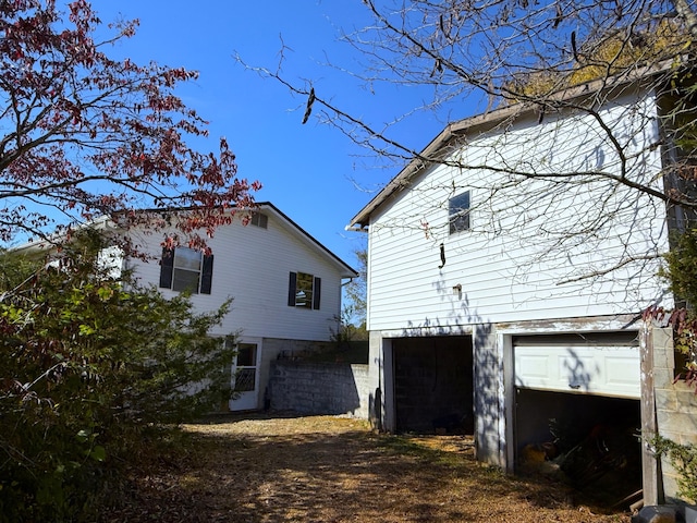 view of home's exterior with a garage