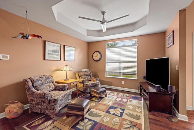 117 Tahlequah Ln, Loudon, TN 37774 - sitting room with ceiling fan, wood finished floors, baseboards, and a tray ceiling