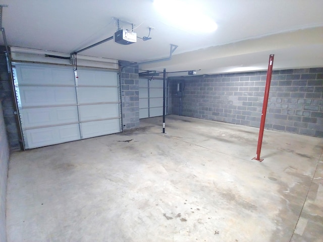 2015 Brights View Ln, Morristown, TN 37814 - garage with a garage door opener and concrete block wall