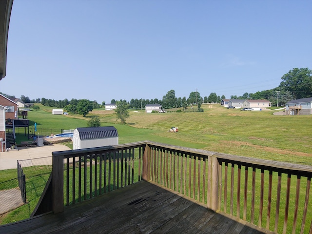 2015 Brights View Ln, Morristown, TN 37814 - wooden terrace with a storage unit and a lawn
