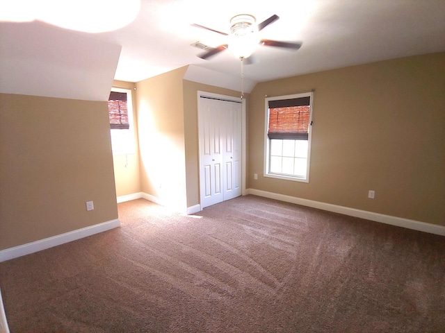 2015 Brights View Ln, Morristown, TN 37814 - unfurnished bedroom with carpet, multiple windows, lofted ceiling, a closet, and ceiling fan