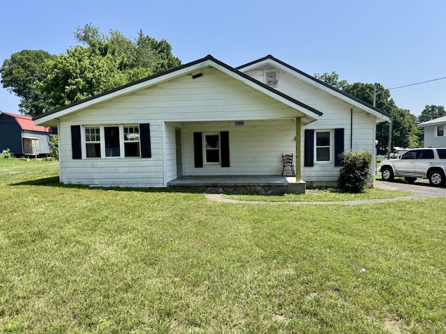166 Clevenger Cut Off Rd, Newport, TN 37821 - view of front of home with a porch and a front lawn