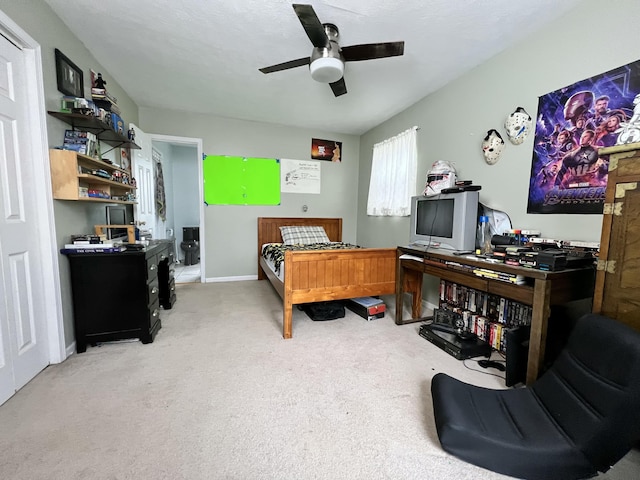 carpeted bedroom featuring ceiling fan