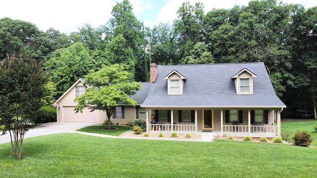 5780 Catawba Ln, Morristown, TN 37814 - cape cod-style house featuring a porch, a chimney, concrete driveway, a front lawn, and roof with shingles
