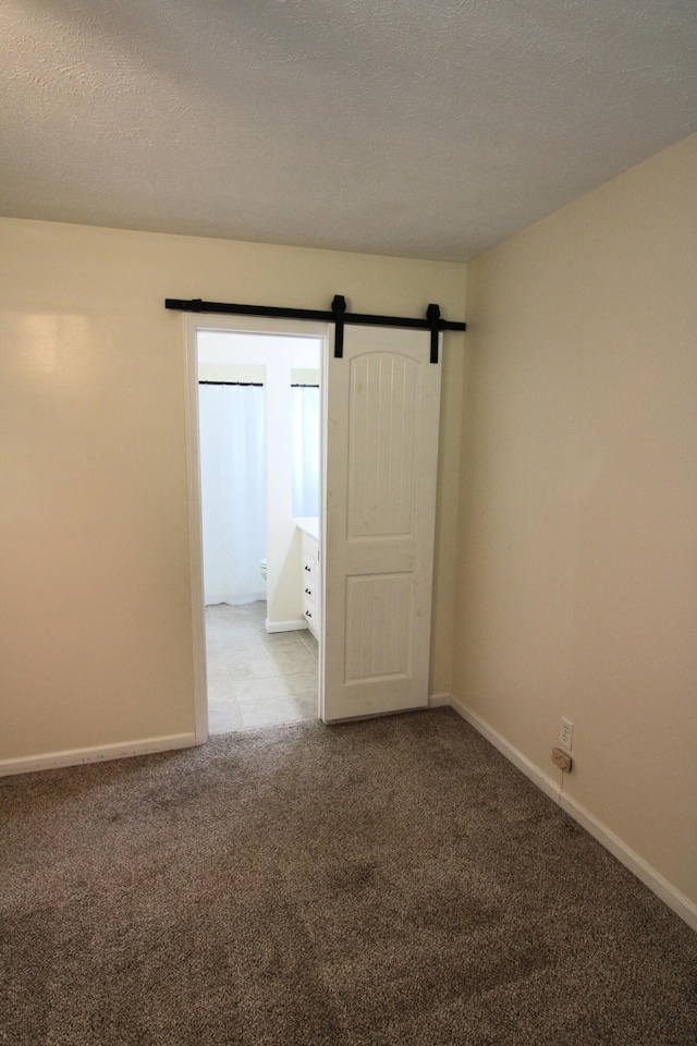 5780 Catawba Ln, Morristown, TN 37814 - unfurnished room with carpet and a barn door