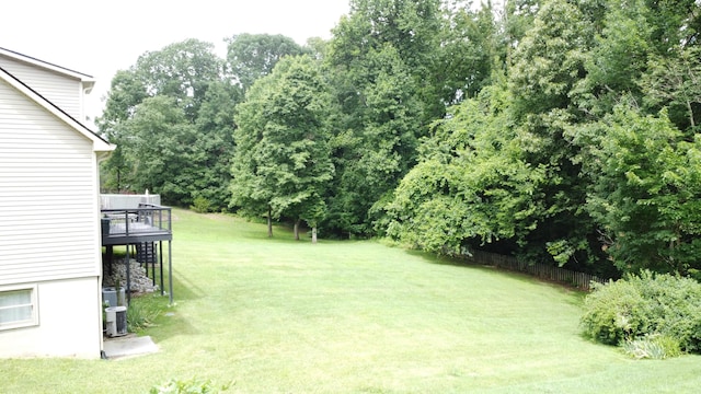 5780 Catawba Ln, Morristown, TN 37814 - view of grassy yard with stairs, a deck, and view of wooded area