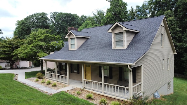 5780 Catawba Ln, Morristown, TN 37814 - view of front of home with covered porch, a front lawn, and roof with shingles
