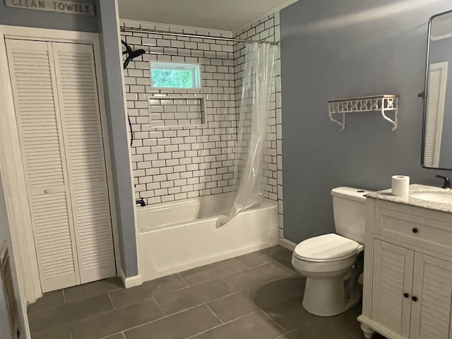 full bathroom featuring tile patterned floors, vanity, shower / bathtub combination with curtain, and toilet