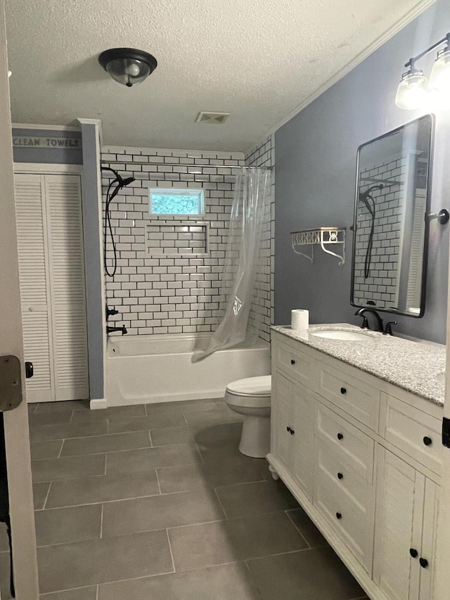 full bathroom featuring vanity, shower / bath combo, toilet, ornamental molding, and a textured ceiling