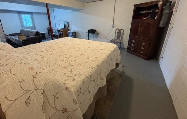 852 Quiet Oaks Way, Dandridge, TN 37725 - bedroom featuring concrete block wall and carpet floors