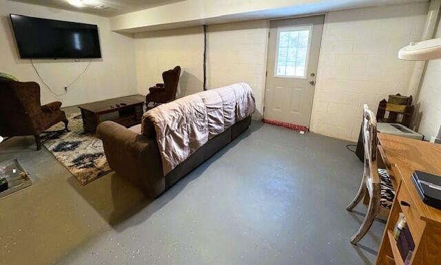 852 Quiet Oaks Way, Dandridge, TN 37725 - living room with finished concrete flooring