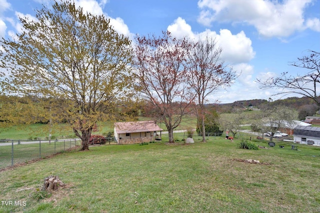 view of yard with fence