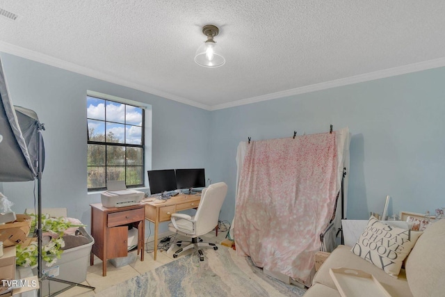 home office with tile patterned floors, visible vents, a textured ceiling, and ornamental molding