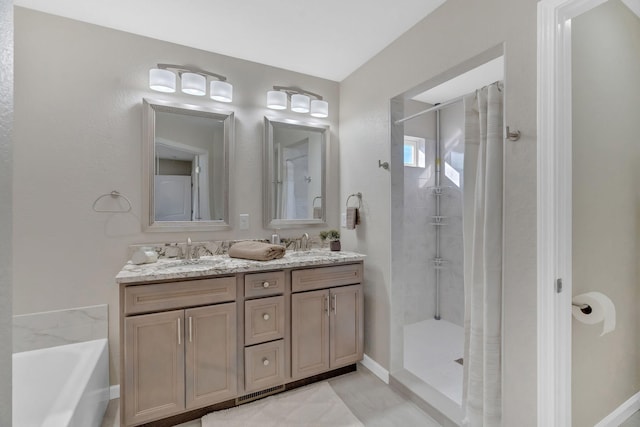 bathroom with double vanity, tiled shower, a sink, and a washtub