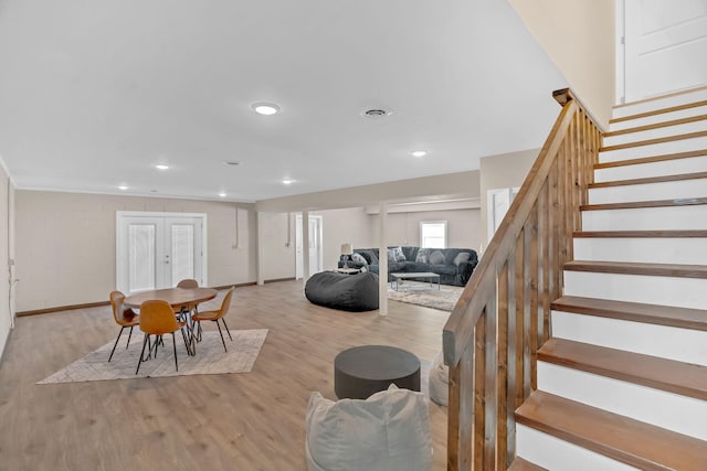 dining space with stairway, recessed lighting, and light wood-style flooring