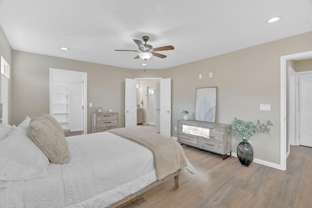 bedroom featuring light wood-style floors, ceiling fan, baseboards, and recessed lighting