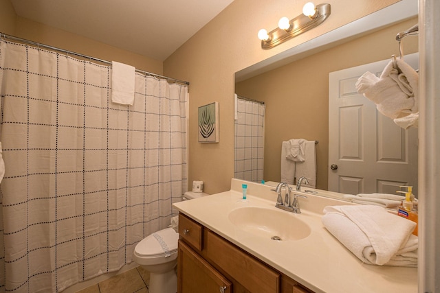 full bathroom with tile patterned flooring, curtained shower, toilet, and vanity