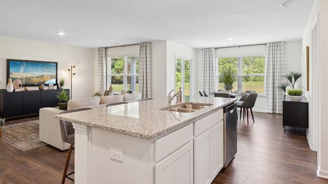 5093 Grist Ln, Morristown, TN 37813 - kitchen with open floor plan, dishwasher, light stone countertops, dark wood-type flooring, and recessed lighting