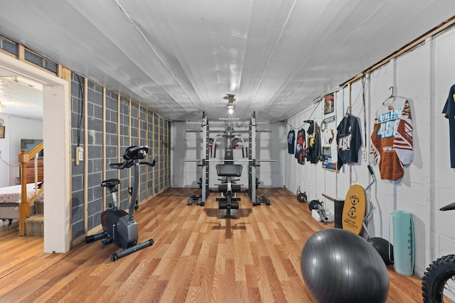 workout area featuring wood finished floors