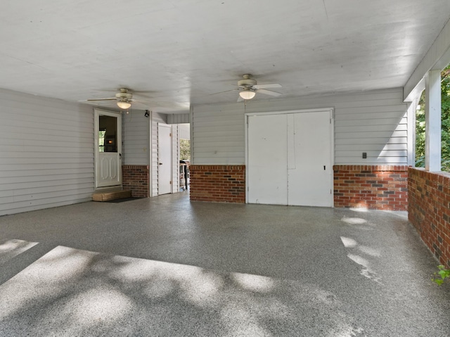 exterior space featuring ceiling fan