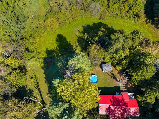 drone / aerial view with a view of trees