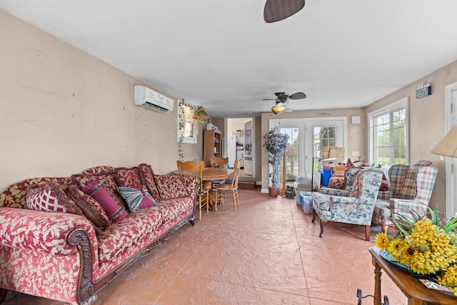 sunroom featuring ceiling fan and a wall mounted air conditioner