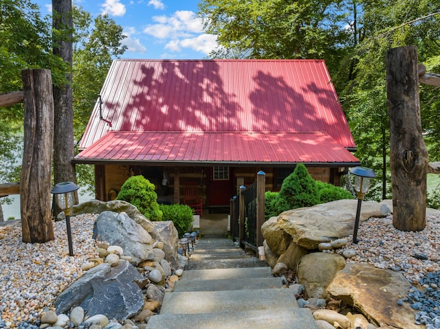 1055 Dean Cir, Dandridge, TN 37725 - rustic home featuring a metal roof and a porch