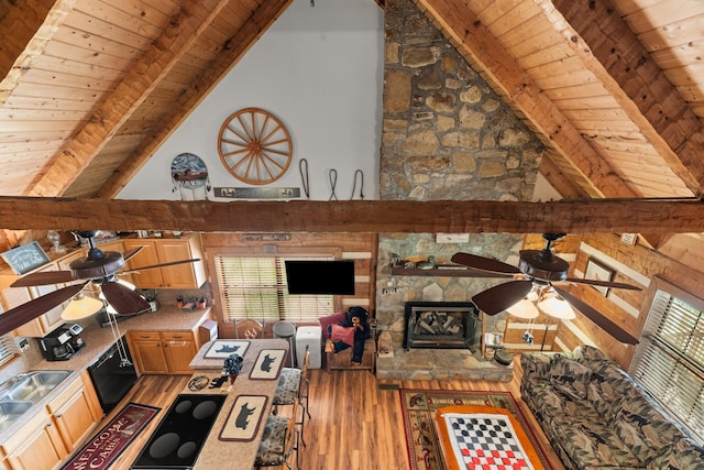 1055 Dean Cir, Dandridge, TN 37725 - living room featuring a wooden ceiling with exposed beams, ceiling fan, light wood finished floors, and high vaulted ceiling