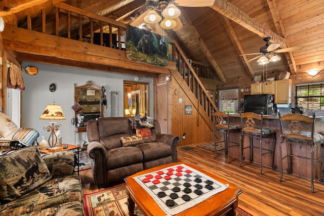1055 Dean Cir, Dandridge, TN 37725 - living area with ceiling fan, wood finished floors, a wooden ceiling with exposed beams, stairs, and high vaulted ceiling