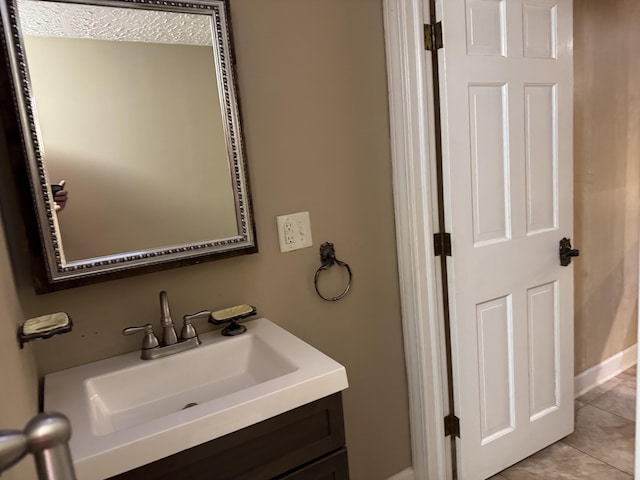 bathroom featuring vanity and tile patterned flooring