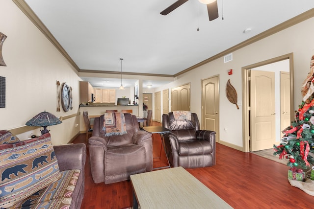 living room with ceiling fan, dark wood-type flooring, and crown molding