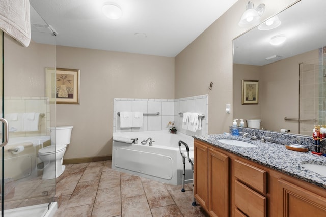 full bathroom with toilet, vanity, and separate shower and tub