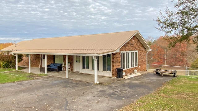 view of front of home with a patio