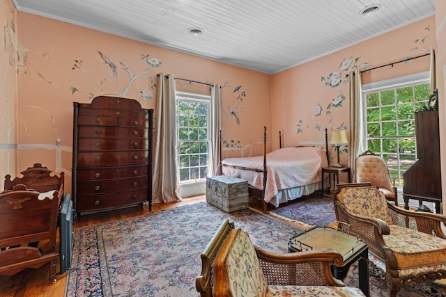 1130 Squirewood Way, Dandridge, TN 37725 - bedroom featuring multiple windows and wood finished floors