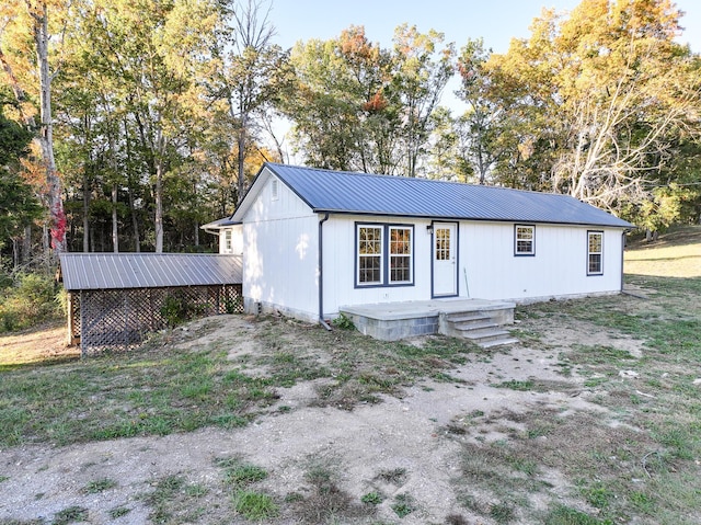 exterior space with a front yard