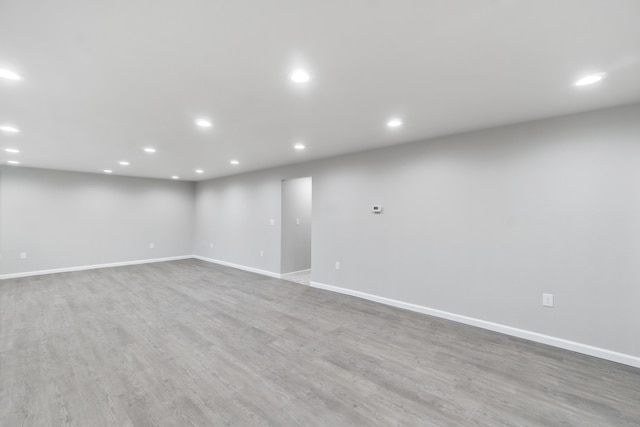 basement with wood-type flooring