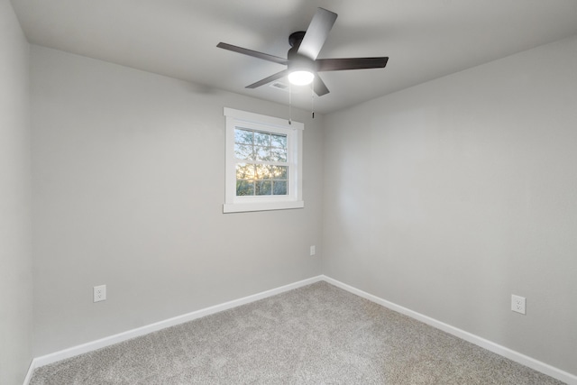 carpeted empty room with ceiling fan