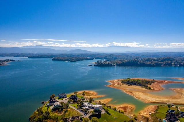 bird's eye view with a water and mountain view